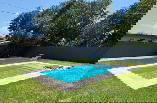 Photo 1 - Boho Chic: 3BR Home With Pool