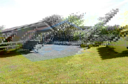 Foto 16 - Pretty Bungalow in Wrzosowo With Garden