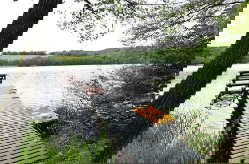 Foto 16 - Holiday Home With Whirlpool at the Lake in Zakowo