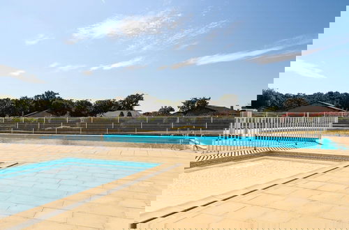 Photo 16 - Spacious Villa With Garden and Pool