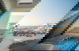 Foto 1 - Superfresh Penthouse Studio Apartment With sea View