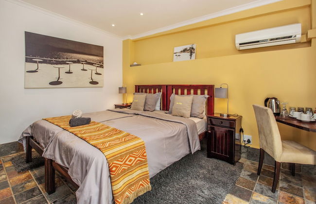Toms Guest House - Photo 7