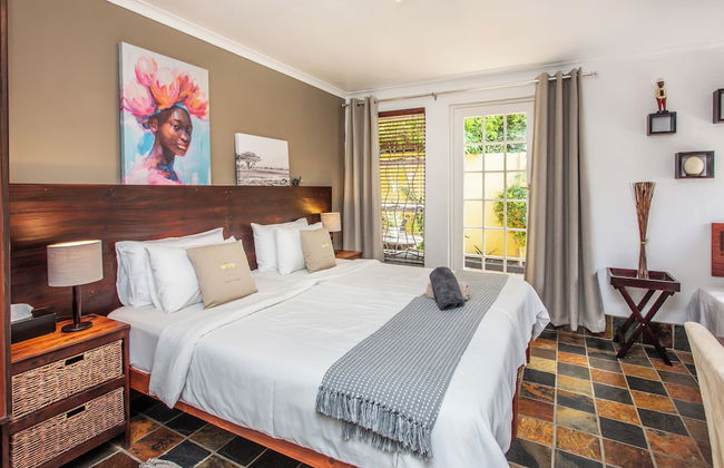 Toms Guest House - Photo 13