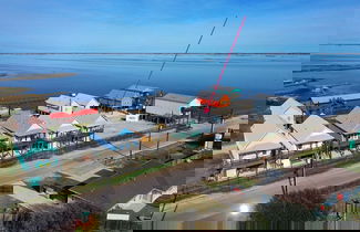 Photo 1 - Waterfront Shared Pool w/ Bay Views, Boat Dock Oscar's Lodge by Avantstay