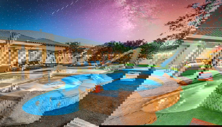 Foto 1 - Pura Vida: Waterslide, Mini Golf, and Games!
