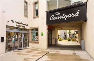 Photo 1 - The Courtyard Apartments
