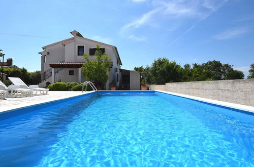 Photo 9 - Lovable Apartment, Pool With Deckchairs, Fenced Garden With Grill, Wifi and Airco