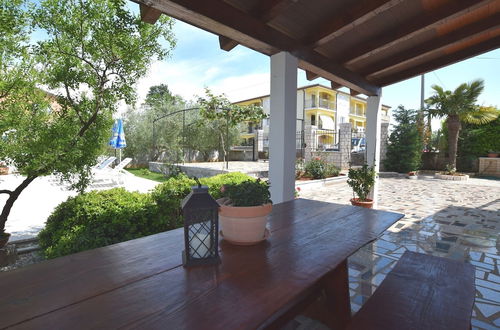 Photo 10 - Lovable Apartment, Pool With Deckchairs, Fenced Garden With Grill, Wifi and Airco