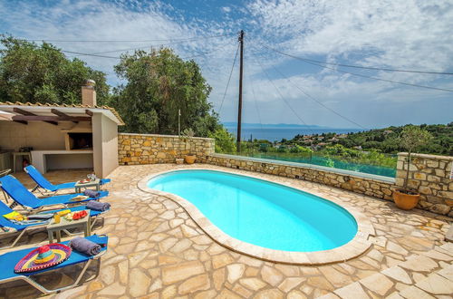 Photo 10 - Loggos Seaview Cottage with Pool by Konnect