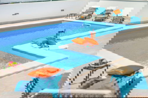 Photo 13 - Modern Villa with Private Pool & Hot Tub near Center & Beach
