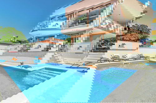 Photo 10 - Modern Villa with Private Pool & Hot Tub near Center & Beach