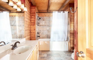 Photo 3 - Pine Needle by Avantstay Log Cabin w/ Gorgeous Views, Hot Tub, Patio & Pool Table