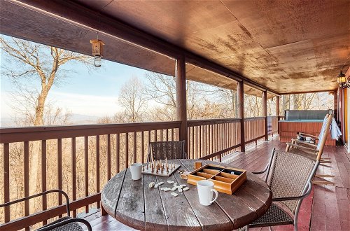 Photo 15 - Pine Needle by Avantstay Log Cabin w/ Gorgeous Views, Hot Tub, Patio & Pool Table