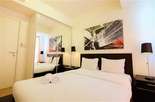 Photo 5 - Homey 2BR Apartment @ Casa Grande Residence