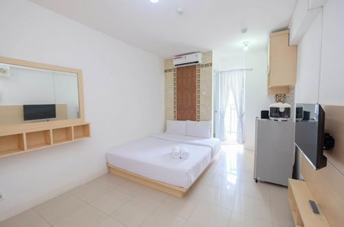 Photo 1 - Homey and Comfort Living Studio Room at Bassura City Apartment