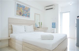 Photo 1 - Cozy Stay and Homey Studio Apartment at Bassura City Apartment