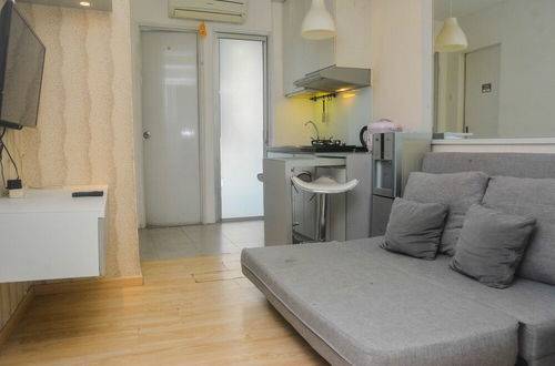 Photo 18 - Minimalist And Warm 2Br At Bassura City Apartment