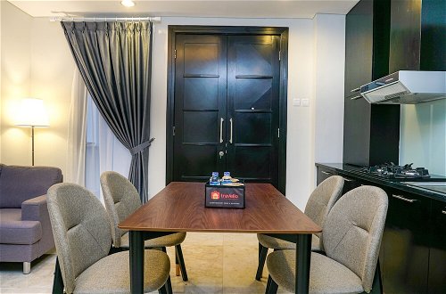 Photo 9 - Modern Furnished 2BR at The Empyreal Condominium Epicentrum Apartment