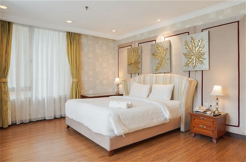 Photo 2 - Elegant And Comfy 1Br At Ascott Thamrin Apartment