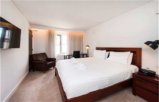 Foto 2 - Comfortable Room With Fantastic Rooftop Views