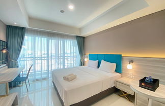 Photo 3 - Modern and Spacious Studio Room at Green Kosambi Apartment