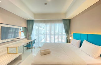 Photo 1 - Modern and Spacious Studio Room at Green Kosambi Apartment