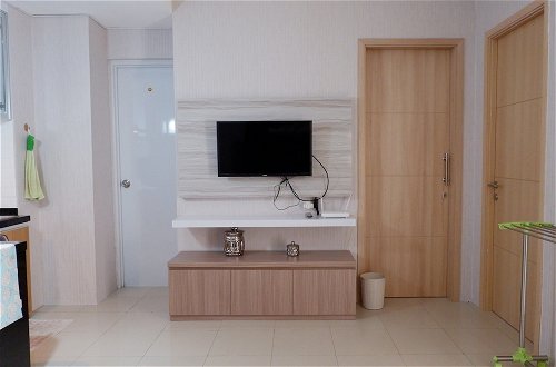 Photo 24 - Comfort 1BR Apartment with Sofa Bed connected to Mall Bassura City