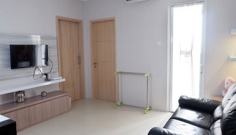 Foto 1 - Comfort 1BR Apartment with Sofa Bed connected to Mall Bassura City