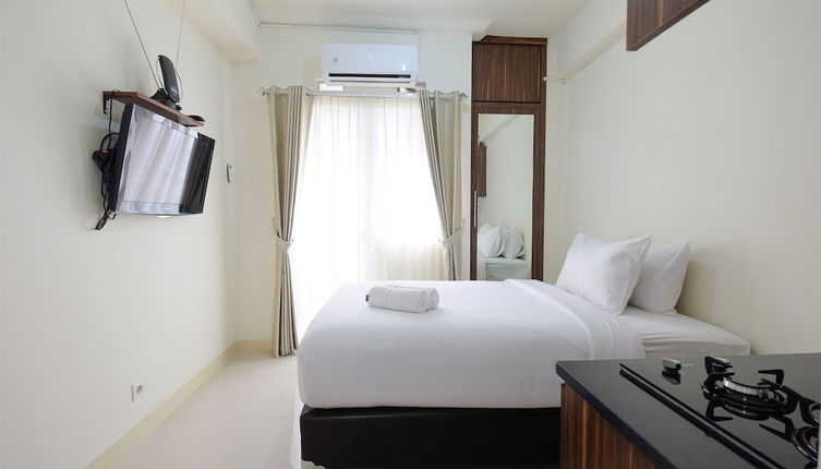 Photo 1 - Comfy Studio Apartment @ Green Pramuka City