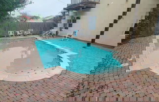 Foto 1 - Beach & Palms Condo