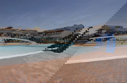 Foto 6 - Lovely Apartment Overlooking the Pool in Bibione