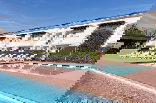 Foto 1 - Lovely Apartment Overlooking the Pool in Bibione