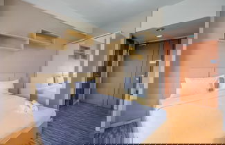 Foto 3 - Cozy Stay And Warm Studio Apartment At Margonda Residence 5