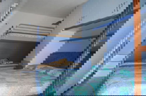Foto 3 - Enjoy the Beach Breeze in our Colorful Flat