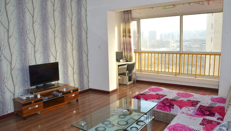 Foto 1 - Lanzhou Longshang Mingzhu Apartment Three-bedroom suite