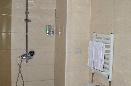 Foto 10 - Lanzhou Longshang Mingzhu Apartment Three-bedroom suite