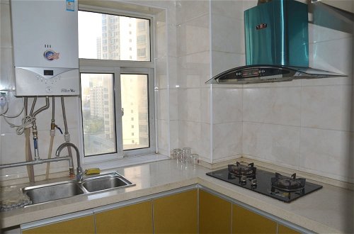 Foto 4 - Lanzhou Longshang Mingzhu Apartment Three-bedroom suite