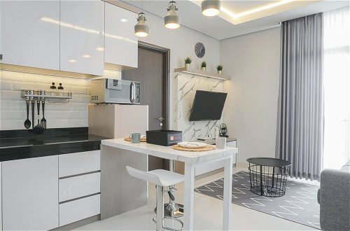 Photo 14 - Luxury Design 2Br At Ciputra International Apartment