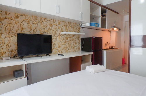 Photo 3 - Compact And Cozy Studio Apartment At Orchard Supermall Mansion