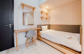 Photo 2 - Homey And Comfort 2Br At Casa De Parco Apartment