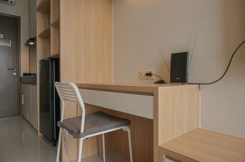 Foto 11 - Fully Furnished with New Design Studio Ciputra International Apartment