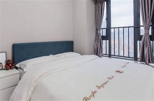 Foto 2 - Meixu Apartment