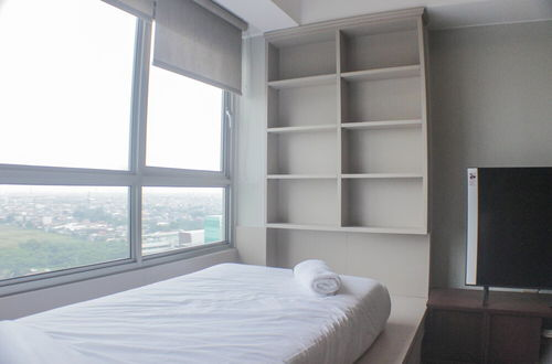 Photo 3 - Warm And Cozy Studio At Springlake Summarecon Apartment