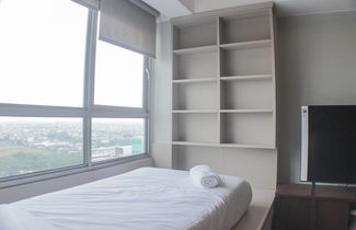 Photo 3 - Warm And Cozy Studio At Springlake Summarecon Apartment