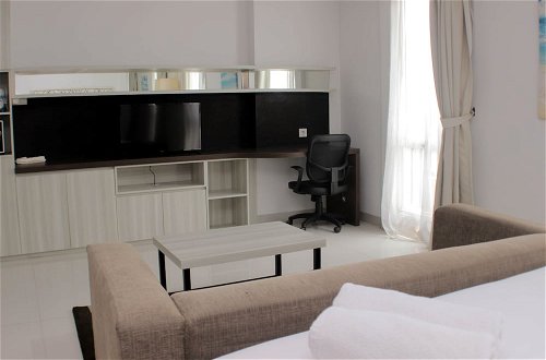 Photo 10 - Comfortable And Spacious Studio At Azalea Suites Apartment
