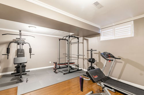 Photo 19 - GLOBALSTAY. Luxury 3BR Townhomes with HOT TUB, Gym, BBQ