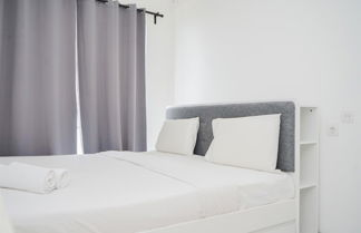 Photo 1 - Comfy And Cozy Stay Studio Room At Sky House Bsd Apartment