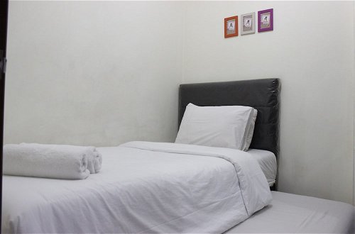 Photo 8 - Minimalist 2BR Apartment at Gateway Ahmad Yani