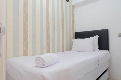 Photo 2 - Cozy And Best Deal 2Br Bassura City Apartment
