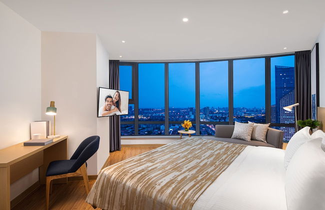 Joysuites Nantong - Foto 7